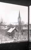 Orig. text: Kyrka, Hus 1935. Kapellgatan/Teatergatan.