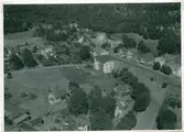 Flygfoto över Högsby sn, Berga, villor och bostadshus.