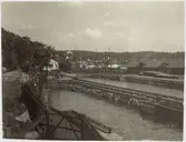 Östra och västra dockorna på Beckholmen, 1920-talet. T h förrådshus.