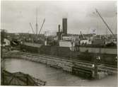 Lastfartyg i östra dockan på Beckholmen, 1920-tal
