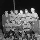 Korphockeylag. 
Mars 1956.