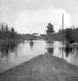 Reportage för Gefle Posten. Översvämningar. Ev i Hamrångetrakten. År 1937