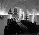 Kyrkoherde-installation i Heliga Trefaldighet. Mars 1939. Reportage för Gefle Dagblad


