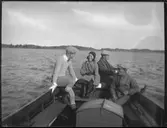 Personer i båt år 1931