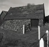 Bod av sten och stråtak vid Melby rör.