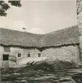 Ladugård i stenfasad i Lofta.