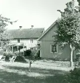 Motiv från en gård i Sjöstorp.