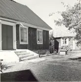 Byggningen med sommarköket till höger på Södra Norrby 1:2.