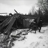 Ladugården i Lilla Kolfly med nedrasade loftboden.
