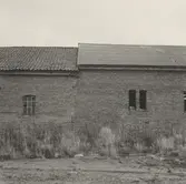 Berga bruksgård.

Ladugård, västra längan från nordväst, detalj.