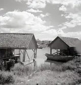 Bodar och storbåt på Strupö.