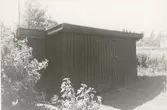 Förrådsbyggnad på fastigheten Tingby 8:6.