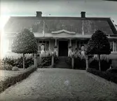 Bostadshus i ordvästra delen av Widebergs trädgård.