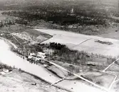 Flygfoto över gården med omnejd.