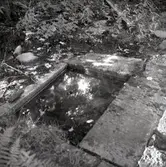 Resterna av Norrby brunn, hälsobrunn som har haft en överbyggnad.