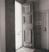 Dörr till trapphus i Gästgivaren 5.