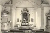 Interiör mot altaret i Mortorps kyrka.