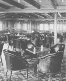 Titanic.
Röksalong med ekpanel och mörkgröna läderfåtöljer. Obsevera glödlamporna och