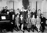Godtemplareloge.

Margit Ekström, Judith Ekström, Emil Ekström, Elsa Eriksson, Artur Eriksson, Augusta Johansson, Marianne Johansson.

Elsa Eriksson, svägerska till Artur Erikson.

Godtemplarorden/IOGT. Den första svenska IOGTföreningen bildades 1879.