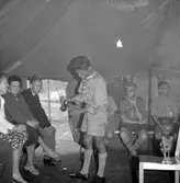 Thure Elgåsen. f. 26/6-1910. d. 6/9-1985. 
Tivedenkännare, konsthantverkare, scoutledare, hembygdsföreningsman. 
Övrig information se personarkiv i Västergötlands museum, Skara.