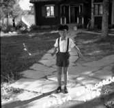 Thure Elgåsen. f. 26/6-1910. d. 6/9-1985. 
Tivedenkännare, konsthantverkare, scoutledare och hembygdsföreningsman. 
Övrig information se personarkiv i Västergötlands museum, Skara.