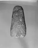 Blyertsteckning av formen på baksidan.