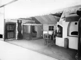 Mariestad. Stuginteriör från Kållands härad vid jubileumsutställningen i Mariestad 1933.