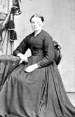 Carolina Josefina Rydholm f. 1827 d. 1880. Drev fotoateljé i Uddevalla 1860-1880. Syster till Sven Leonard Rydholm.  Övertog sin broders ateljé på Södra Drottninggatan 13.