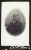 Porträtt av ångbåtskapten Johan Olsson