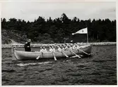 1 stycken båt roddarlag.