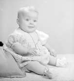 Spädbarnet, Roos Larsson, december 1946