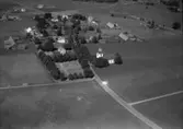 Flygfoto över i Tånnö, söder om Värnamo. Nr. K. 86