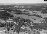 Flygfoto över Voxtorp i Värnamo kommun. Nr. D. 1887