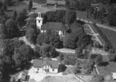 Flygfoto över Voxtorps Kyrka i Värnamo Kommun. Nr. D. 1888