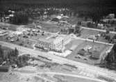 Flygfoto över Vaggeryds möbelfabrik i Vaggeryd, Nr. H. 1903