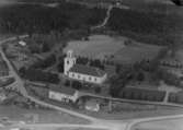 Flygfoto över Malmbäck kyrka i Nässjö kommun. nr C 1815