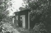 Exteriör. Vedbod och avträde för Stjärnan, byggt 1862, Gustavsberg.