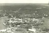 Exteriör. Flygfoto över Gustavsbergs fabriksområde med omnejd. Sannolikt från 200 m höjd.