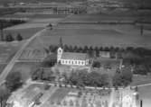 Flygfoto över Rogberga Kyrka i Jönköpings kommun. Nr H 1920.