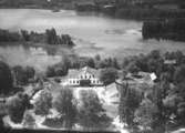 Flygfoto över Riddersberg i Jönköpings kommun. Nr  H 1922.