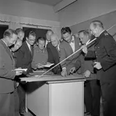 Brandkårskurs.
Oktober 1956.