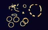 Guldsmycken från romersk järnålder som påträffats i Skedstad.