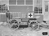 Förbinderivagn med rött kors