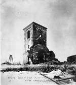 Rivning av brandskadat kyrktorn.Skadat i brand 1887.