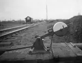 Handmanövrerad växel. Växelklot med låsanordning, växel är låst i sitt läge och kan inte läggas om av obehörig.