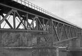 Bro  över Skellefte älv vid Slind på linjen mellan Bastuträsk och Skellefteå. Bron var färdigbyggd 1911.