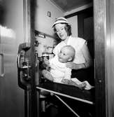 Barnkupé med statister.