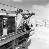 Skidåkare, tåghems-resenärer vid Låktatjåkko och Riksgränsen.