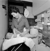 Barnkupé med statister.