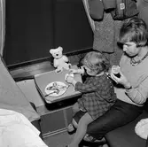 Barnkupé med statister.